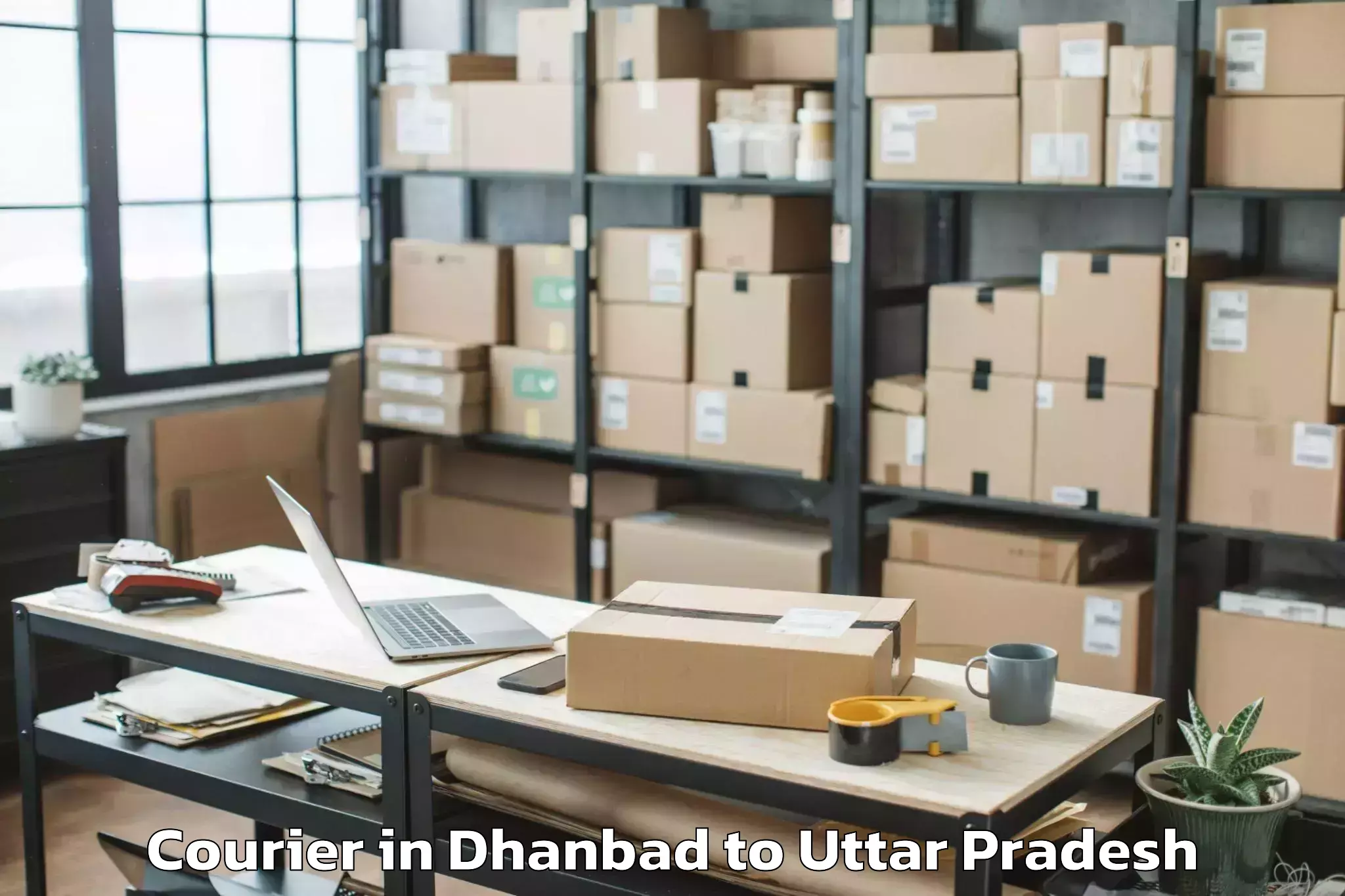 Reliable Dhanbad to Kaimganj Courier